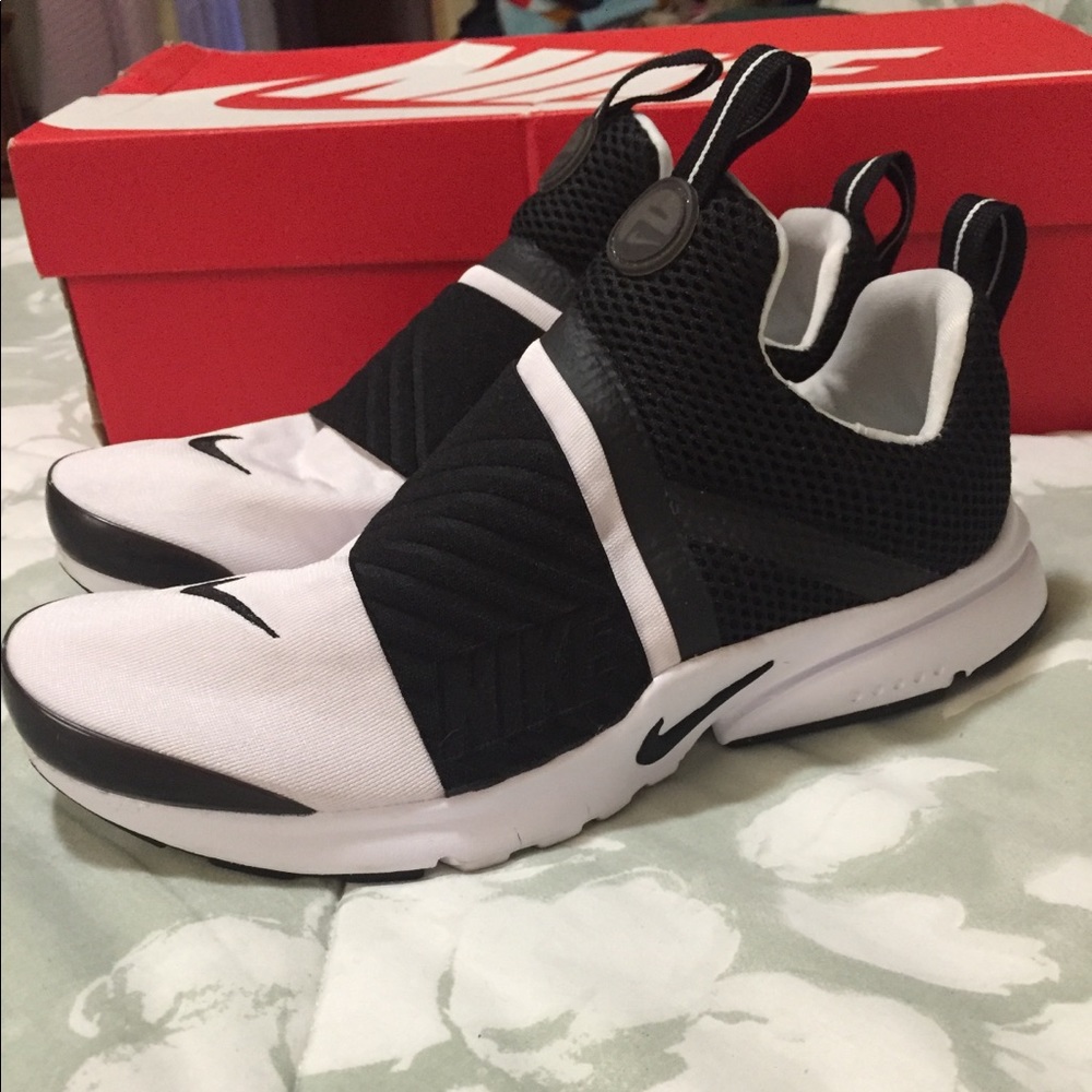 White and black Nike presto